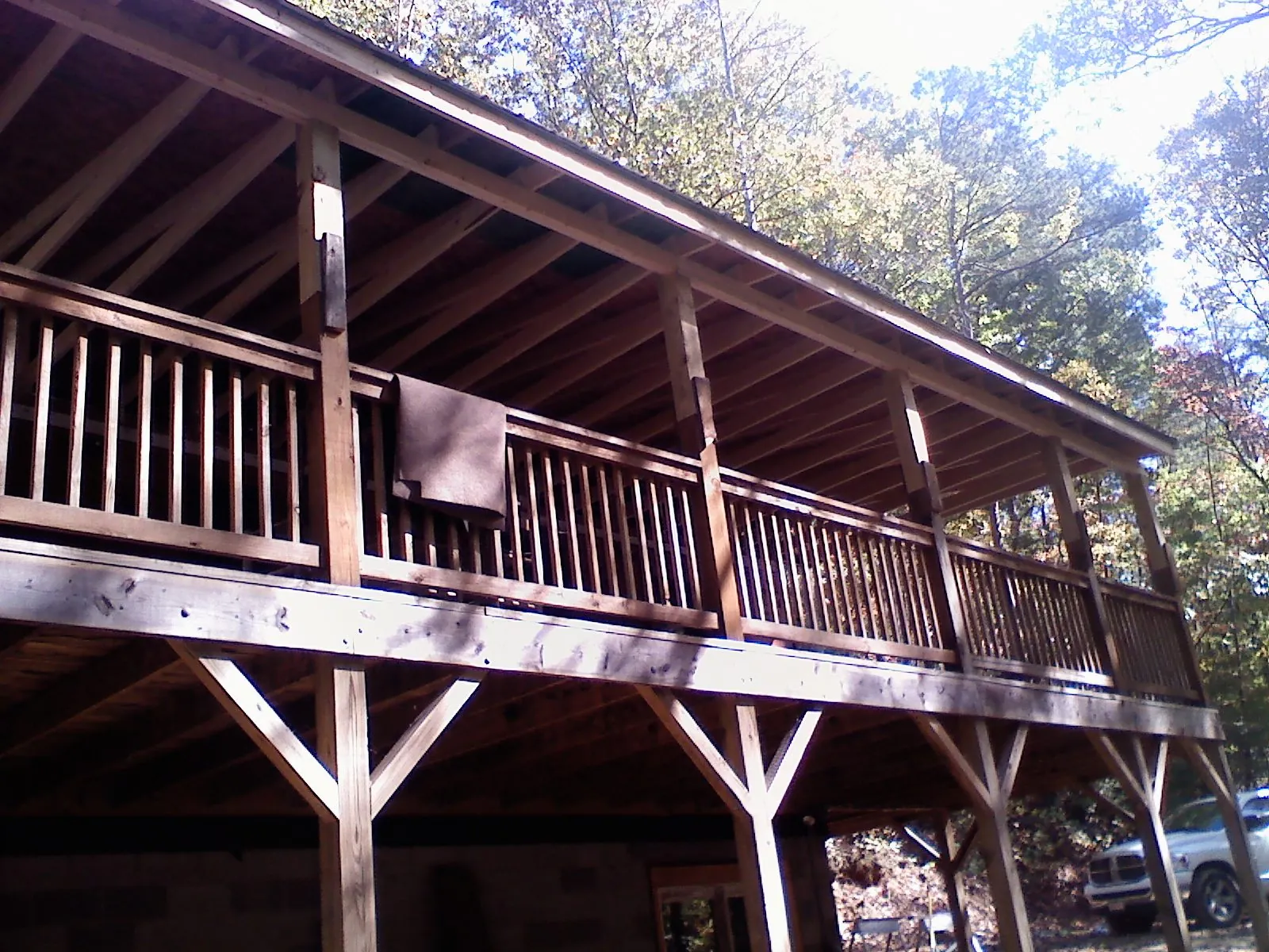 Timber framing under a new elevated porch and deck — Roof Leak Repair in Illiopolis by Roofing Brothers